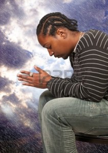 12550409-black-african-americanl-christian-man-in-deep-prayer